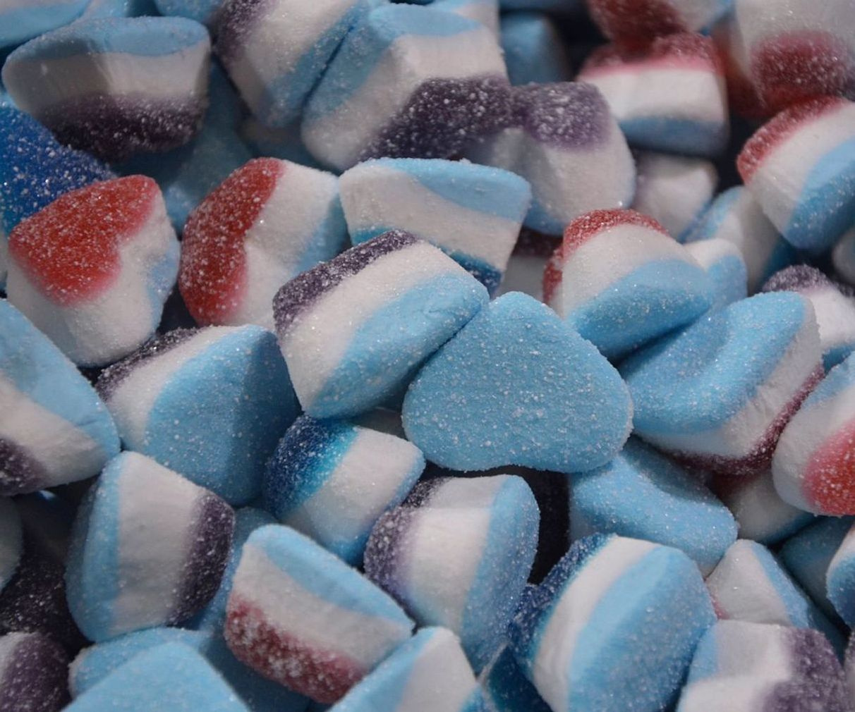 Hands wrapping artisan confectionery with care